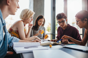 Five students learning together.