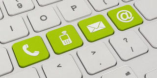 contact A white keyboard with four green keys. On the green keys are symbols like a telephone, a cell phone, an envelope and an „@“